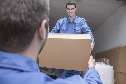 Man with a van loading boxes for a Crofton Park move