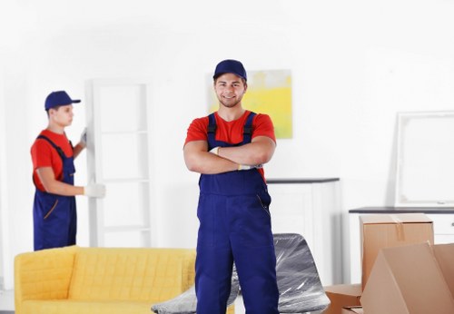 Worker checking safe access before lifting items