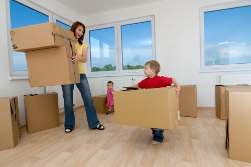 Professional movers loading a van in Croftonpark