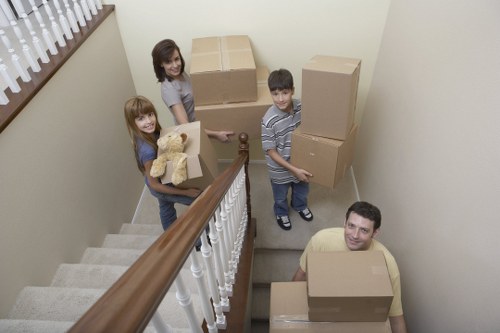 Professional removal team handling furniture in Croftonpark